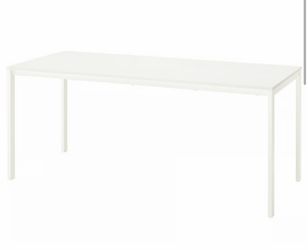 IKEA white table seats 6-8 people