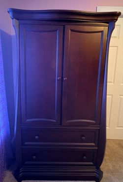 Dark wood armoire / storage cabinet