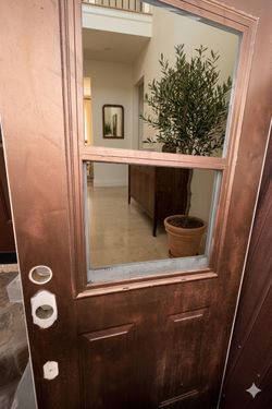 Used EXTERIOR front DOOR with a WINDOW. Standard size - 36 inches wide by 80 inches tall