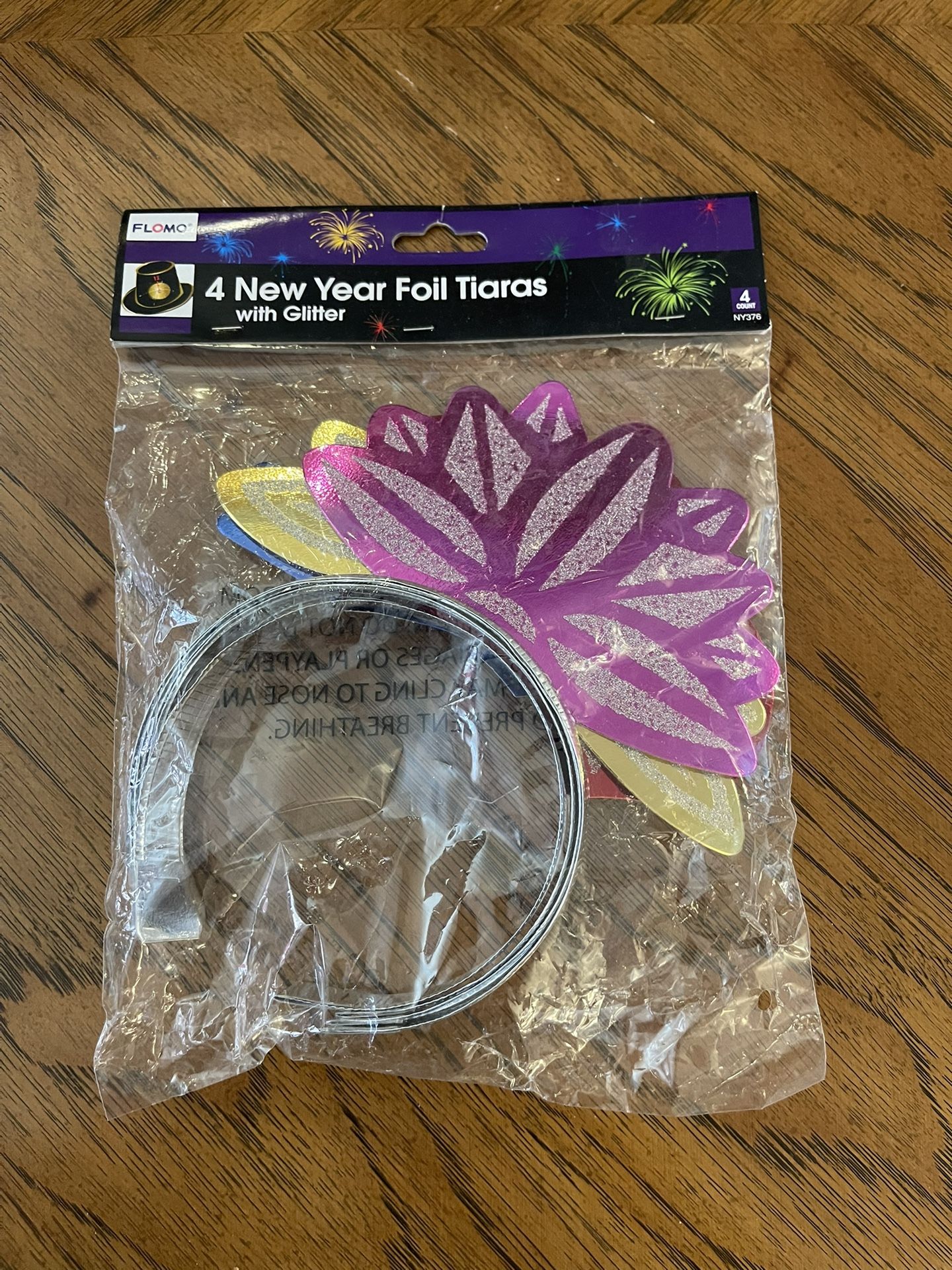 1 New Package of 4 New Year’s Eve Foil Tiaras with Glitter