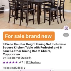9 Piece Counter Height Dining Set Includes a Square Kitchen Table with Pedestal and 8 Faux Leather D