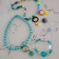 KIDS PLAY JEWELRY  ELSA NECKLACE, BRACELET FROM DISNEYLAND, ANOTHER BRACLET AND PRINCESS NECKLACE  SEE DESCRIPTION 