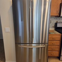 STAINLESS STEEL REFRIGERATOR,  RANGE, MICROWAVE AND DISHWASHER 