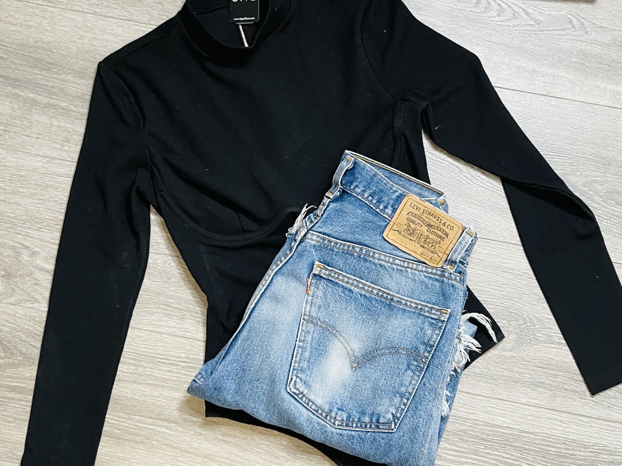 NWT Black bodysuit. K