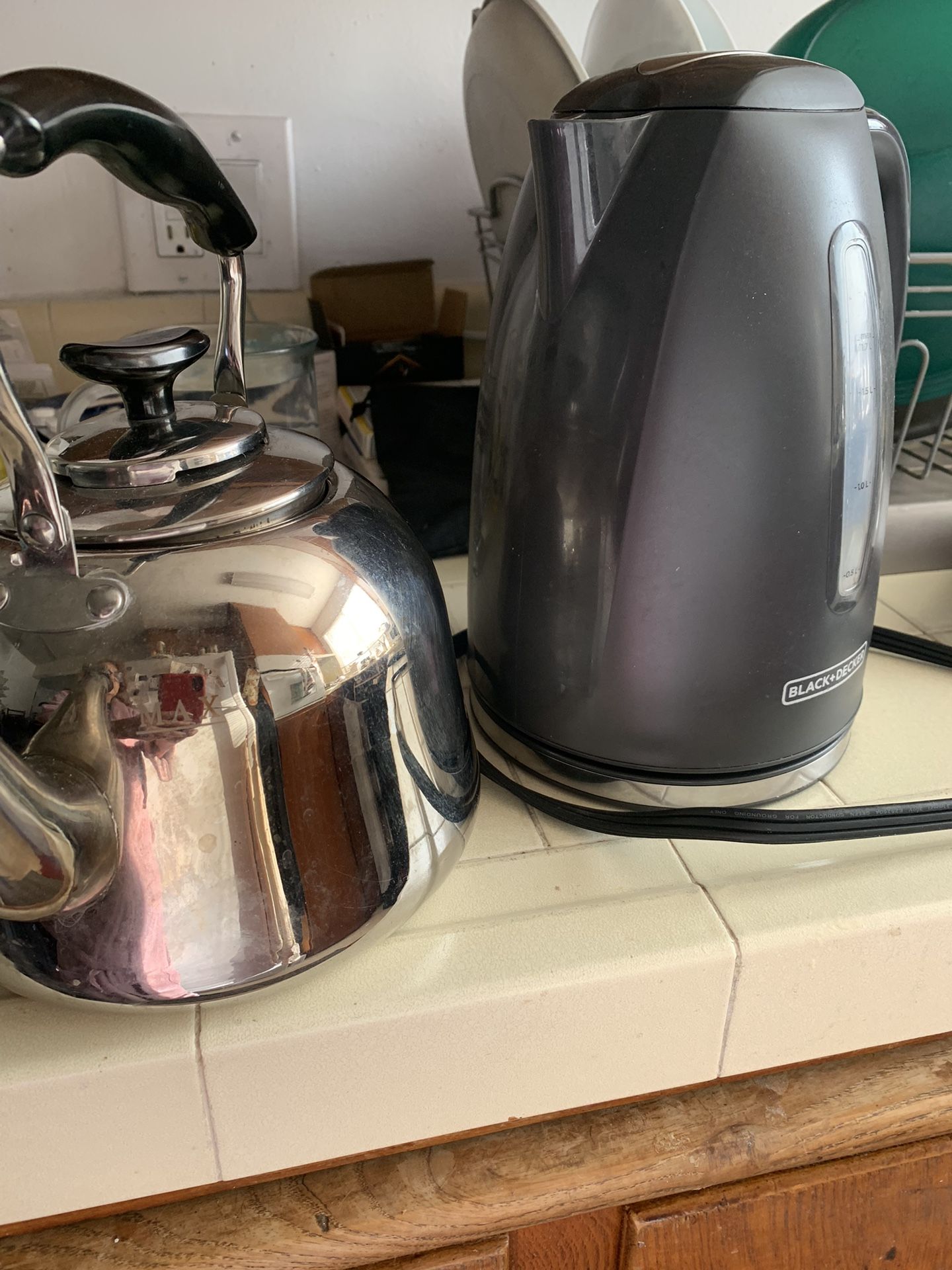 (1) Silver Water Stop Top Kettle And (1) Electric Water Kettle. Reduced EACH $10