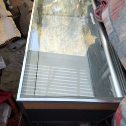 Free Glass Display ( 48 Ins Long  and 28 Ins Tall