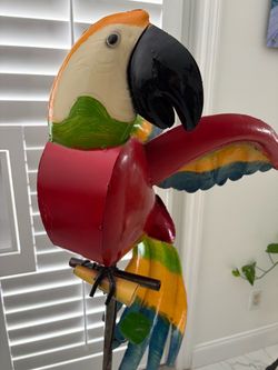 Metal parrot on perch 55in tall