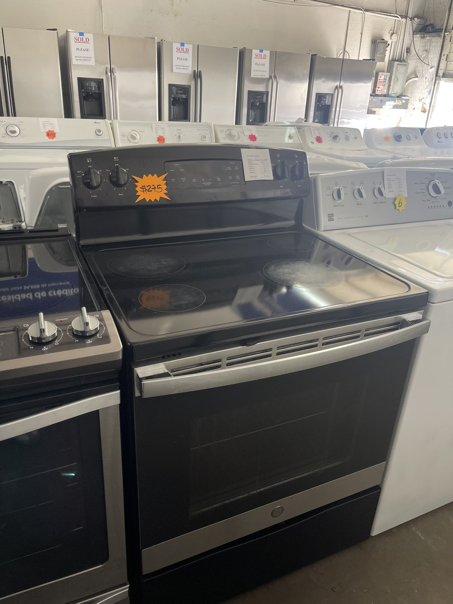 GE Stainless Steel Black Glass Top Electric Stove