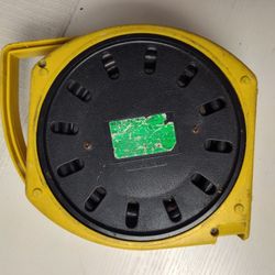 Manual cable reel with four sockets.
