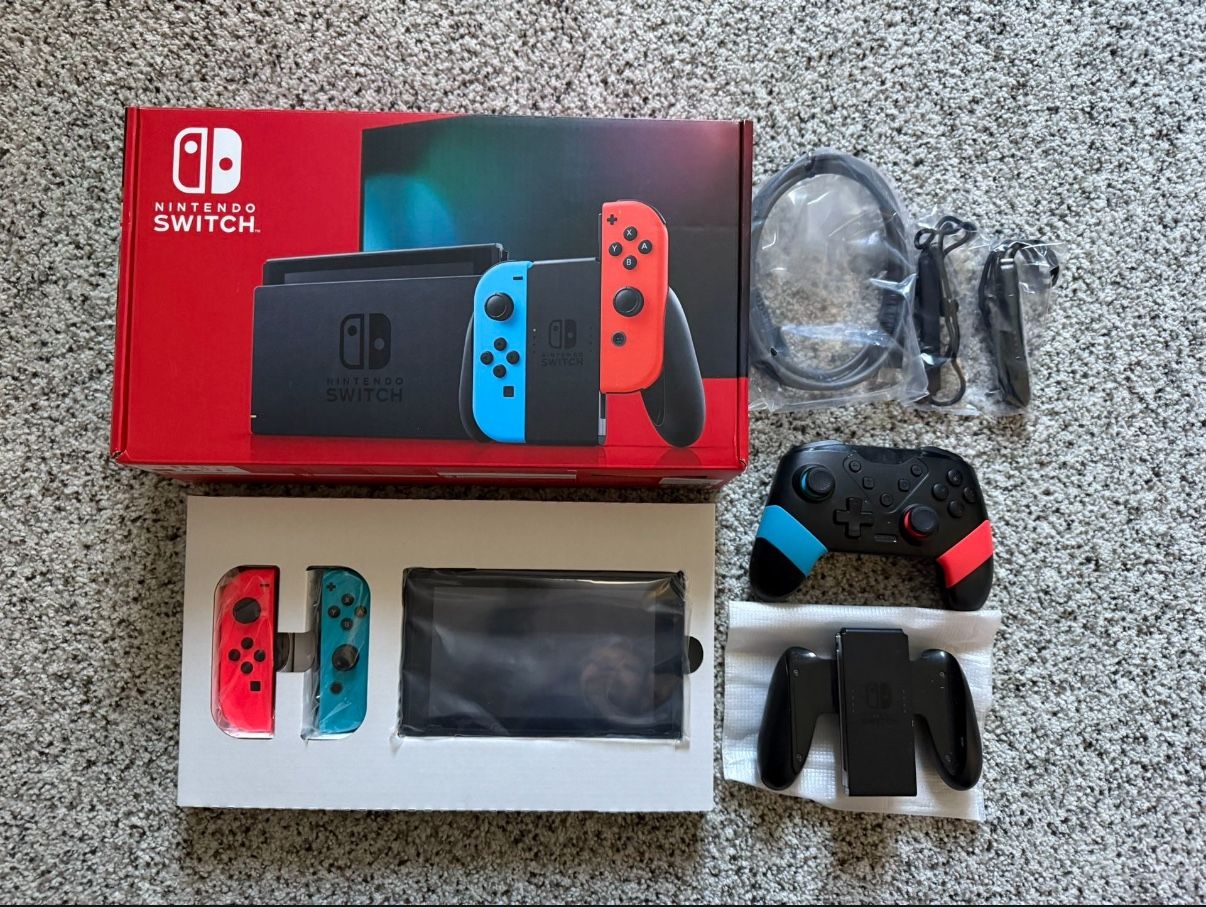 Nintendo Switch Console + Joy Cons + Controller + Zelda Link Case + Grip