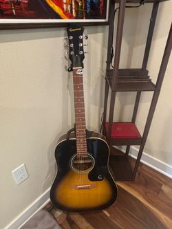 Guitar with guitar strap