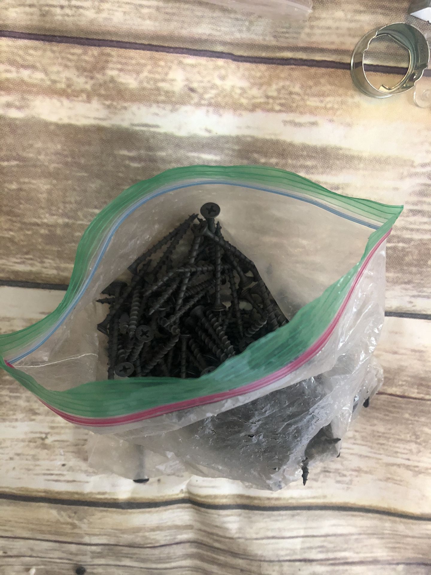 Bag of drywall screws and other tools/ fastening items