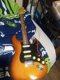 Killer stratocaster guitar made up of a fender American butterscotch body, and a fender mexican neck,also with a DiMarzio humbucker all American hardw