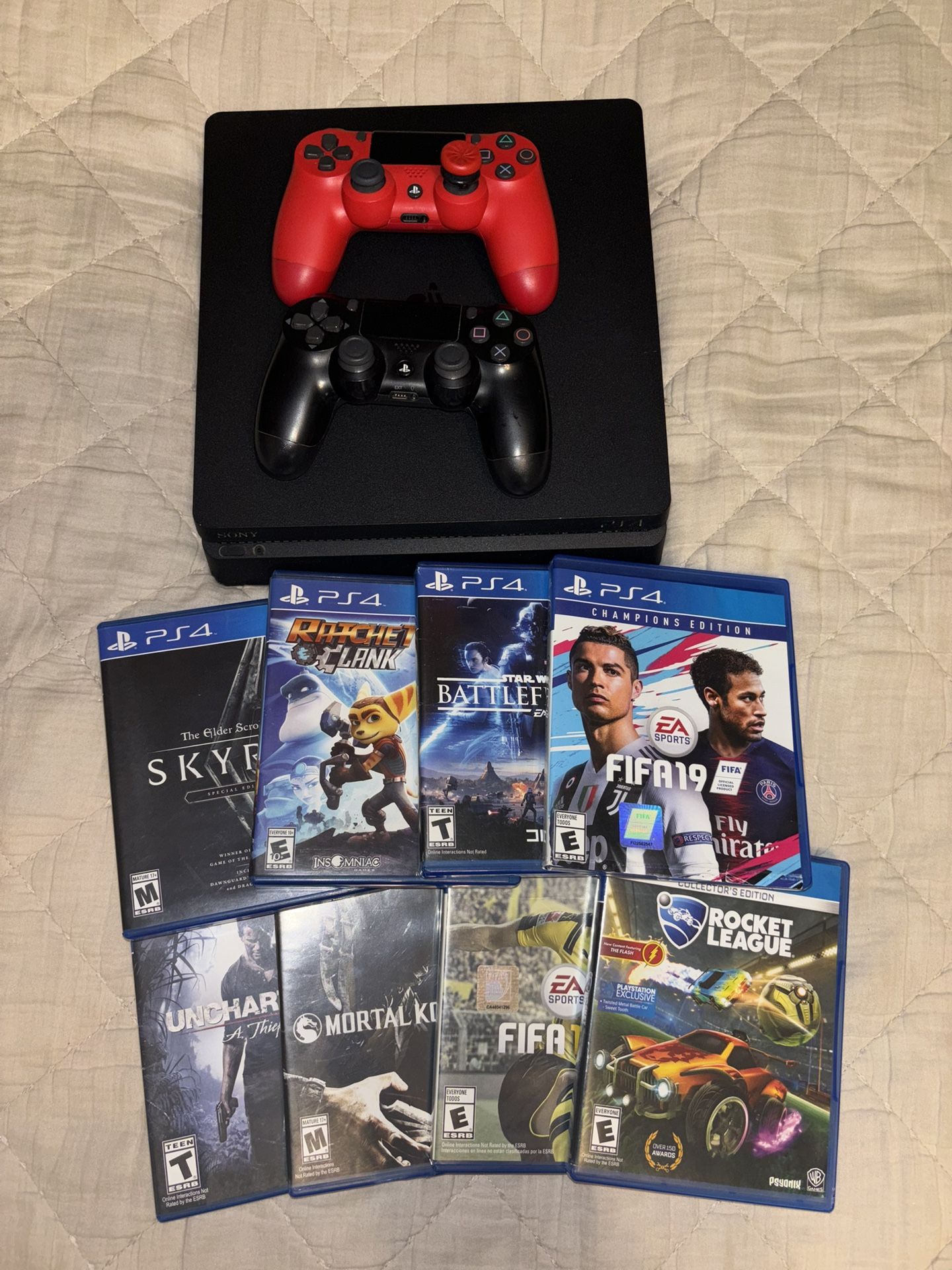 PS4 Slim 1TB + 2 Controllers + 8 Games