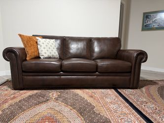 Two set of dark brown leather 3-seater sofas. Very comfortable and stylish, perfect for a living room. Good condition and ready for a new home. Sellin