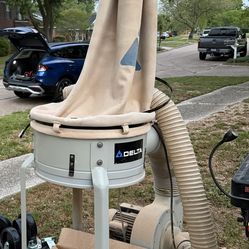 Delta Machinery dust collector, used in woodworking shops to capture sawdust and deb