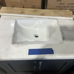 30” Bathroom Vanity in blue ,single sink soft close solid wood with vanity top in white   $475  Luke’s liquidations warehouse Address:  2434 N Forsyth
