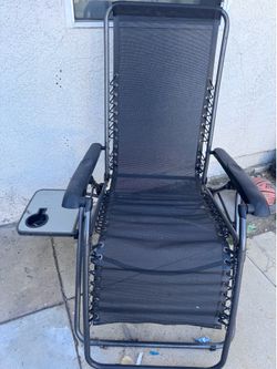 Folding chair with cup holder and table