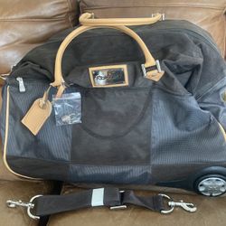 REEBOX  Rolling Duffle Bag W/ Shoulder Strap 