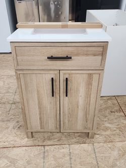 BRAND NEW Style Selections Dolton 24-in Light Natural Oak 
Bathroom Vanity with White Top Sink