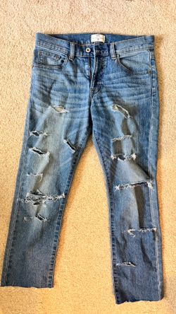 Blue distressed denim jeans with ripped details #distressed #denim