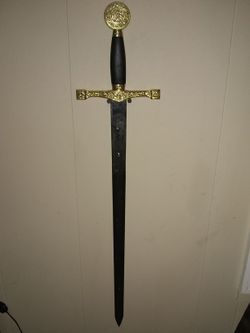 Gold n black handled sword