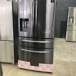 Samsung black stainless steel refrigerator with French doors