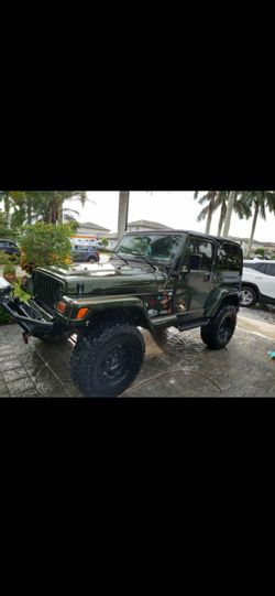 Jeep Wrangler tj Sahara 4.0L v6 inline (Clean Title)