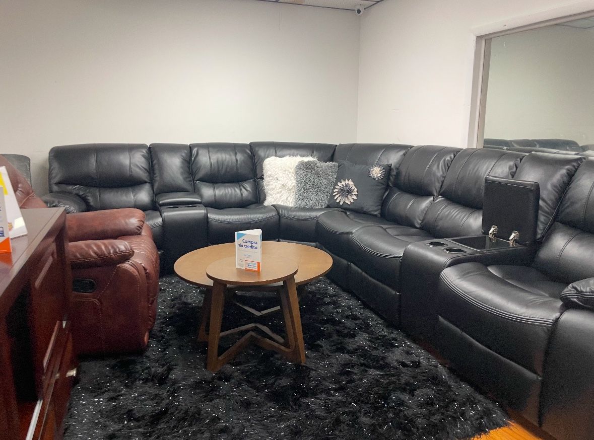 Holiday blowout sale. Madrid gray leather reclining sectional only $1499. Easy finance option. Same day delivery.
