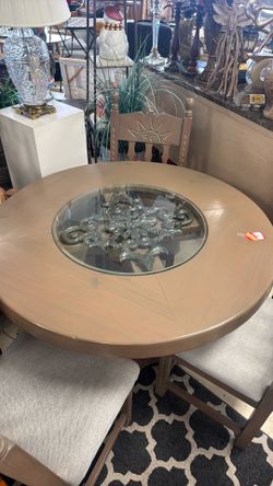 Round Dining Room Table with three chairs