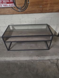 Glass top coffee table