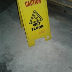 $10 Caution Wet Floor Sign