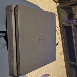 PS4 Slim 1TB + 8 Physical Games - Excellent Condition