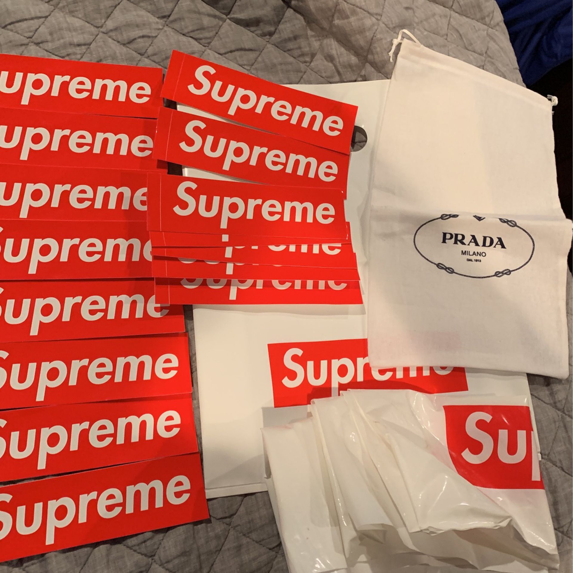 Supreme Box Logo Stickers, 2 Bags And A Prada Shoe Bag