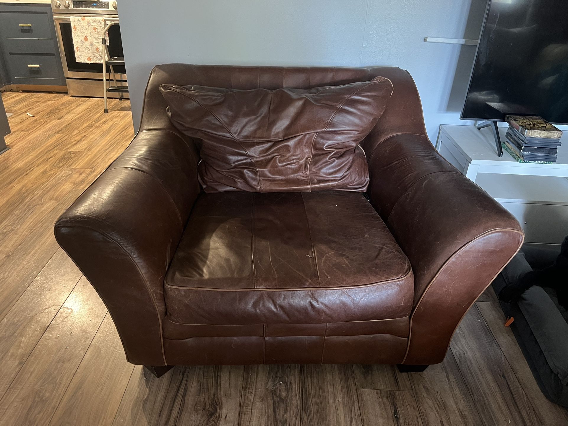 Beloved Supple Leather Chair And Ottoman