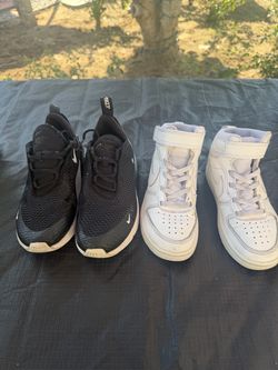 Two Pairs of Kids Nike Sneakers
