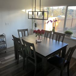 Dining Table , Color Gray And Is 6 Chairs 