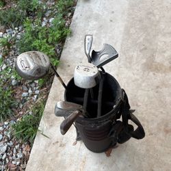 Golf Clubs And Holder 