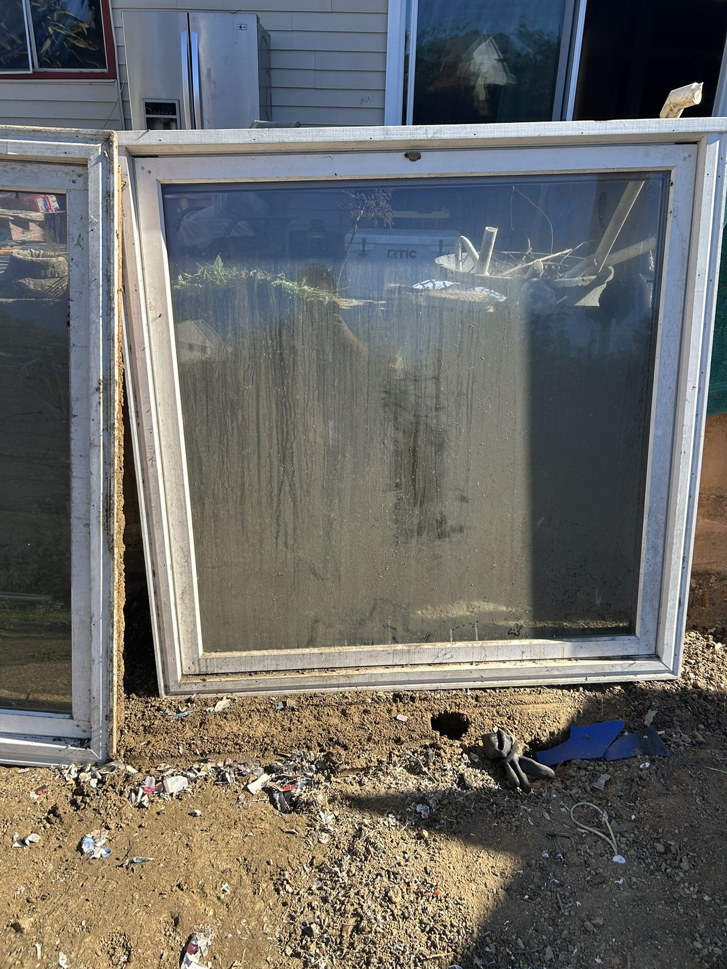 large window screen (also known as an insect screen or fly screen) designed to cover a window opening.