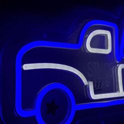 Blue Truck Sign With Flag 