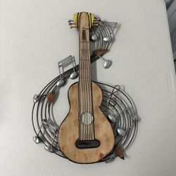 Rustic Metal Guitar Wall Art with Swirling Music Notes 