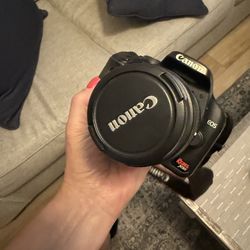 Canon Rebel XSi DSLR Camera with Lens – $150
