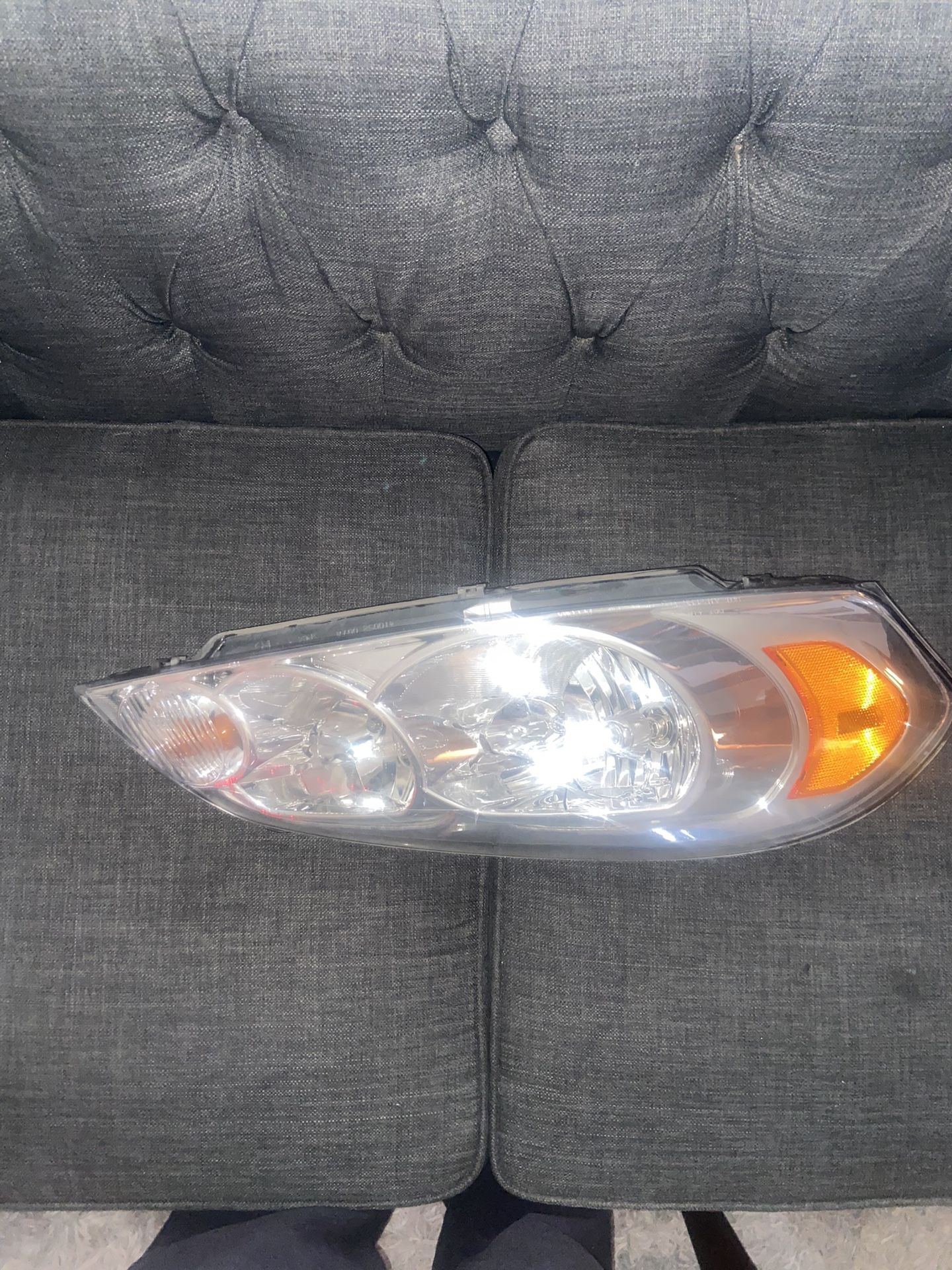 Passenger 2006 Chevy Impala Headlight