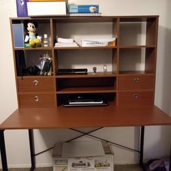Brown desk with black metal legs