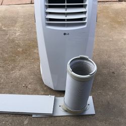 LG Portable AC 10,000 BTU With The Hose And Attached Windows 