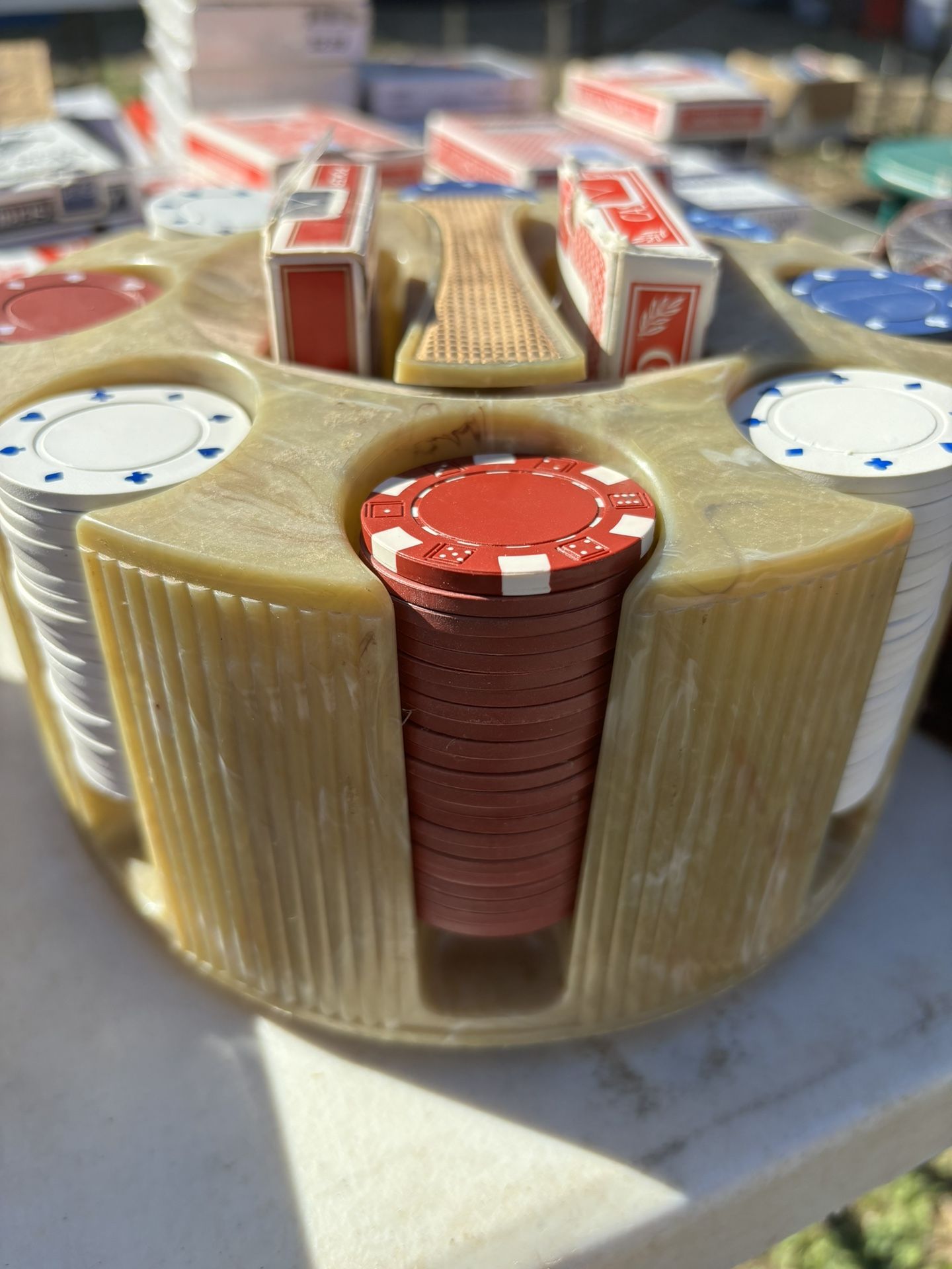 Spinning Casino Playing Chips With Cards