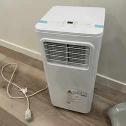 GE 6100 BTU DOE 115-Volt Vented Small Room Portable Air Conditioner