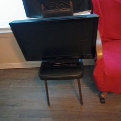 Older Tv Works Just Leans Forward 
