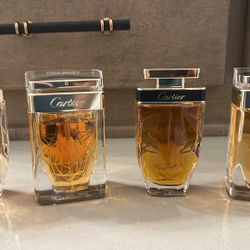 Multiple new bottles of Cartier Fragrances