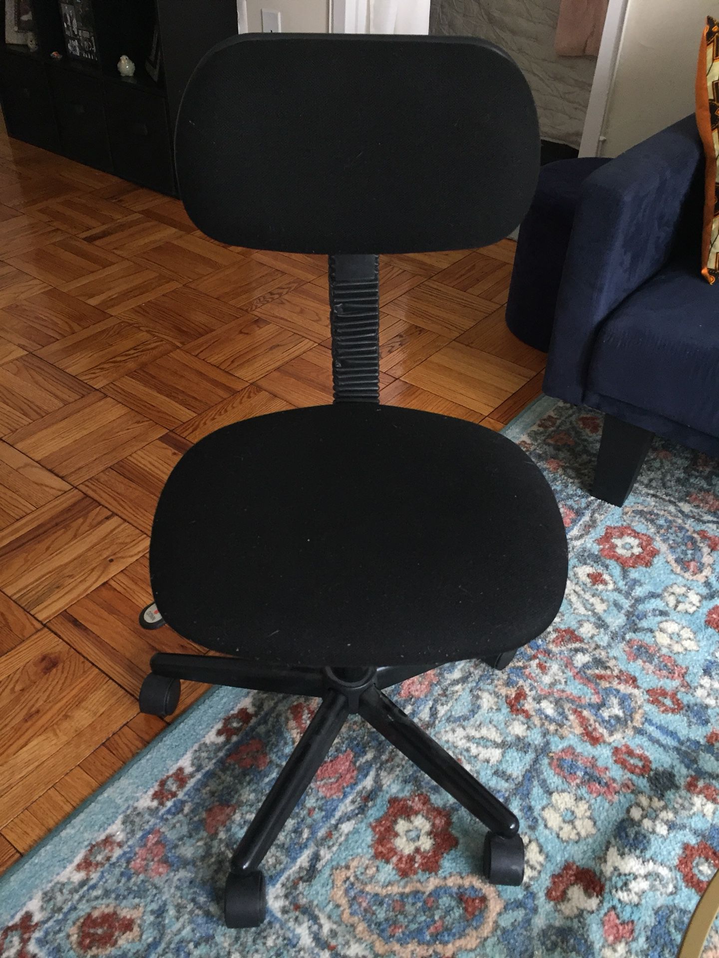 Small black rolling office chair
